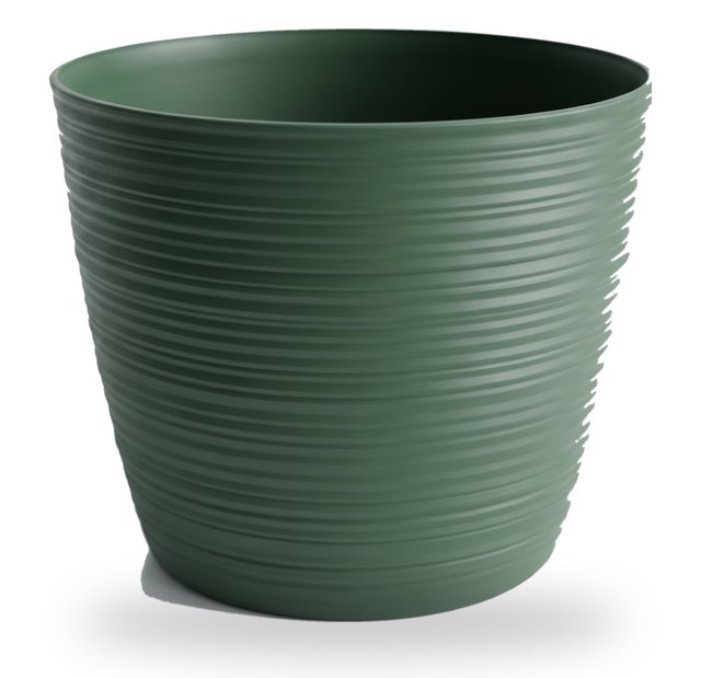 Empty pine green ribbed plant pot in the 18 cm size, on a light background