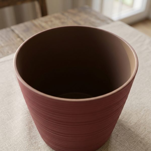 Looking into an empty marsala pot, the same shade inside as outside