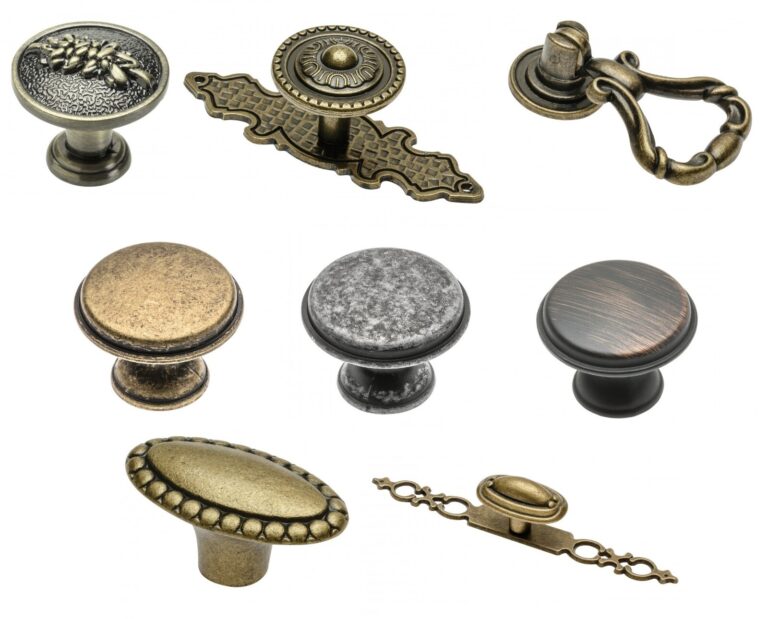 Decorative cabinet knobs and drop handles in antique brass, copper and silver-style finishes