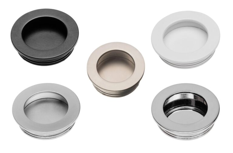 Round recessed finger pull handles shown in five finishes including black, white and chrome