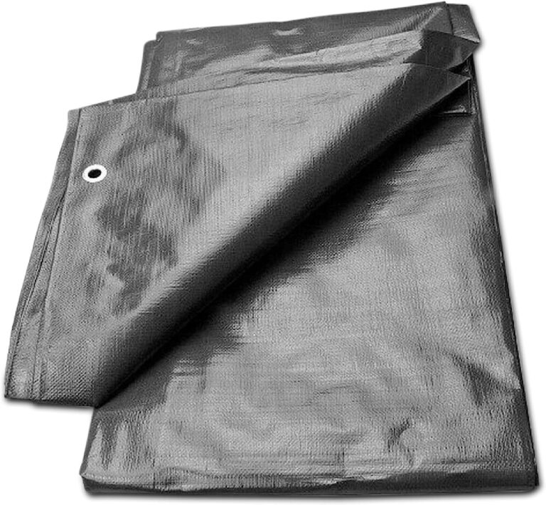 Folded dark grey tarpaulin showing the hemmed edge and a metal eyelet