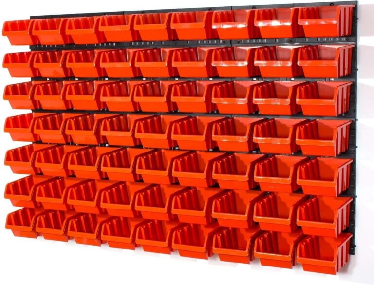 Black wall pegboard fitted with rows of medium red storage bins