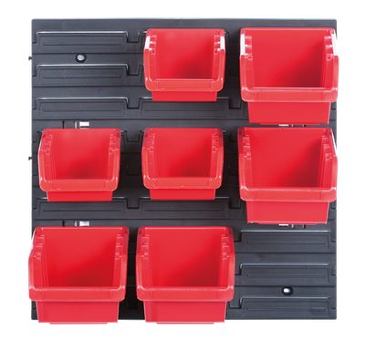 Black wall pegboard fitted with seven red storage bins in two sizes