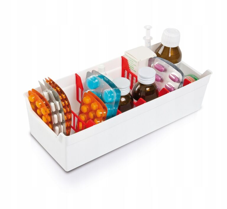 Slim white storage organiser with dividers, shown holding medicine bottles and blister packs