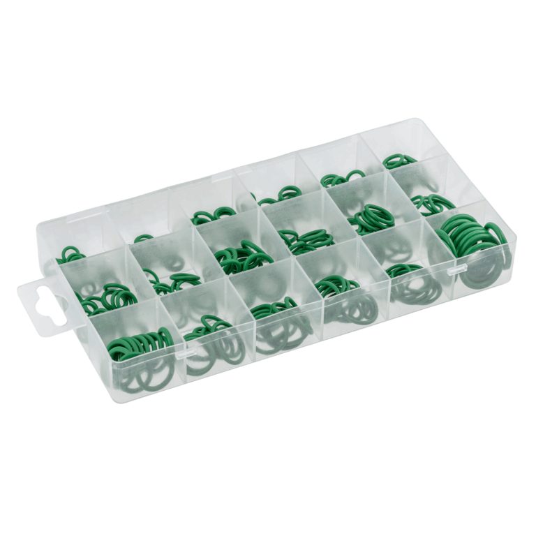 Green O-rings sorted into compartments of a clear plastic storage box