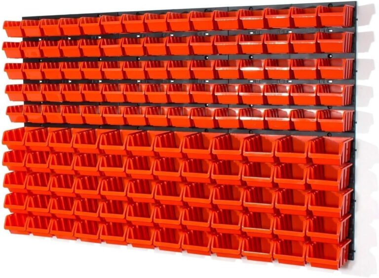 Black wall pegboard fitted with rows of red storage bins in two sizes
