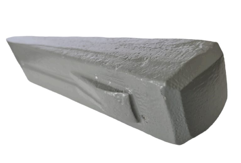 Grey log-splitting grenade wedge with a pointed end and broad striking face