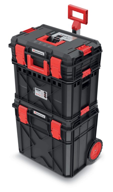 Stacked black and red modular tool storage units with carry handles and a raised pull handle
